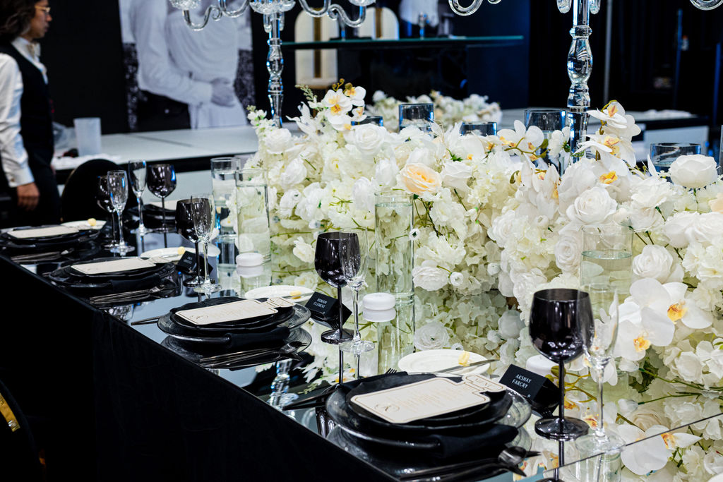 The fashion-forward celebration featured details down to the die cut menu cards, which were in the shape of Chanel perfume bottles.