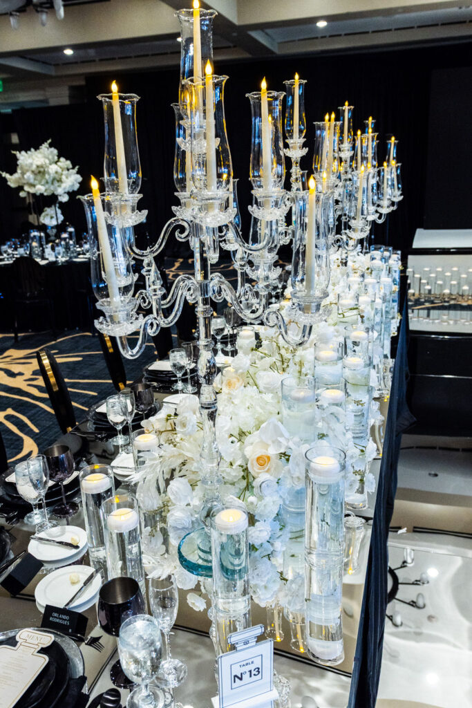 Ribbed glass and crystal candelabra centerpiece showcasing textural design for luxury events.